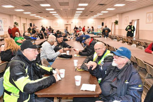 Riders fuel up at the Ogdensburg Fire Department before starting Dale’s Chilly Chili Run.