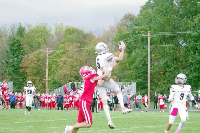 Wallkill Valley defensive back Kellan Brown makes a leaping catch for an interception in the first half of the game against Lenape Valley on Friday, Oct. 6. The Patriots won, 21-14. (Photos by George Leroy Hunter)