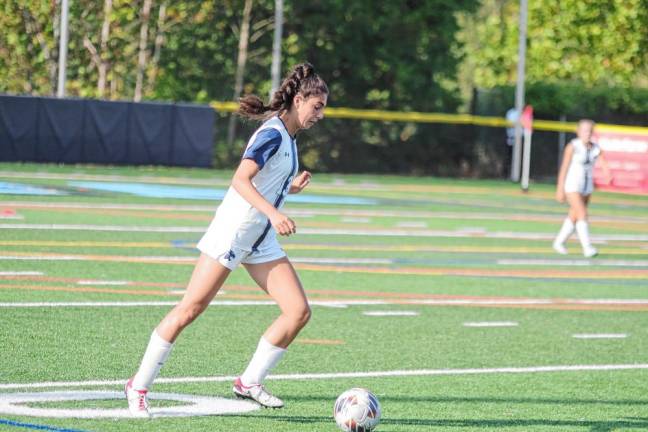 Chatham's Mia Semioli handles the ball.