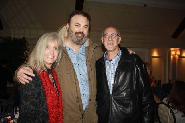 Donna and Mark Staccioli with Chris Roach (center) at Lake Mohawk Country Club. Photos by Rose Sgarlato