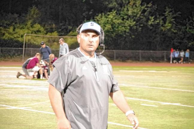 <b>Sparta High School varsity football head coach Frank Marchiano on the field.</b>