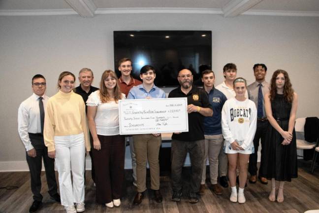 Ralph Rojas scholarship recipients pose with Peter Litchfield, center, commander of VFW Post #7248 in Sparta. (Photos by Dave Smith)