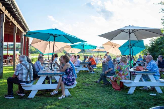 <b>After touring the gardens, event attendees joined gardeners at Meadow Blues Coffee in Chester, N.Y for an after-party, where they voted for their favorite gardens. Photo: Aja Brandt.</b>