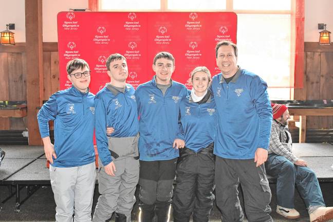 <b>Connor Carson, Justin Italiano and Aron Italiano with their coaches, Arianna DeMartino and Ron Italiano, all of Bergen County. (Photo by Maria Kovic)</b>