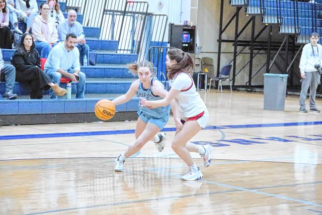 Sparta's Abby Connors drives while covered by a Northern Highlands defender. She scored seven points.