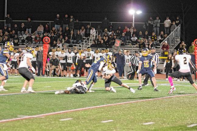 <b>Vernon wideout Gavin Bruno (22) is hit by West Milford linebacker Cole Czerepak in the first half. Bruno caught one touchdown pass.</b>