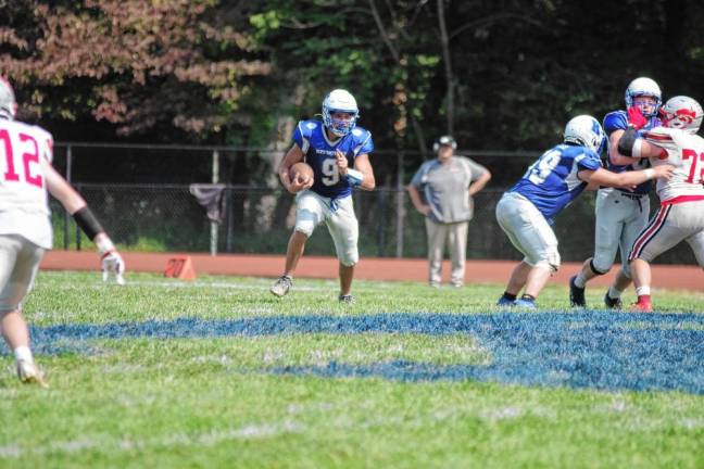 <b>Kittatinny quarterback Jack Brex carries the ball on a keeper in the second half. Brex threw two touchdown passes in the game against High Point on Saturday, Sept. 14.</b>