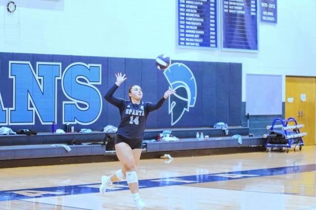 Sparta's Giselle Faria makes one kill, one dig, 12 assists and three service points.