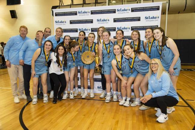 The Sparta High School girls basketball team poses with the first-place trophy.