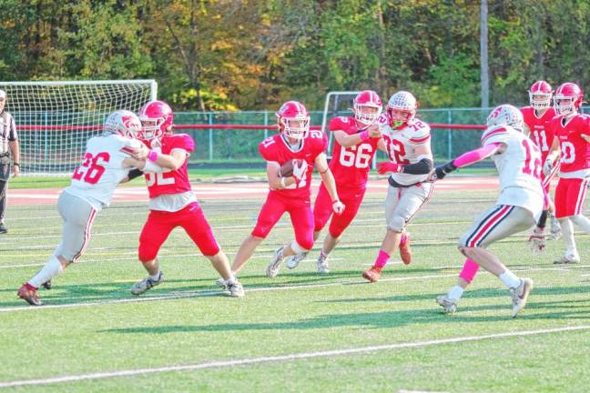 <b>Lenape Valley running back Kevin Giusti carries the ball during a play.</b>