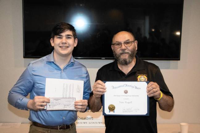 Nate Rogoff receives a $4,000 scholarship. At right is Peter Litchfield, commander of VFW Post #7248 in Sparta.