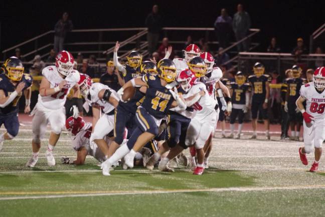 Vernon ball carrier Franco Luna (44) moves into the open field on his way to score a touchdown in the second half. Luna scored two touchdowns in the game against Lenape Valley on Friday, Sept. 22. Vernon won, 28-0. (Photos by George Leroy Hunter)