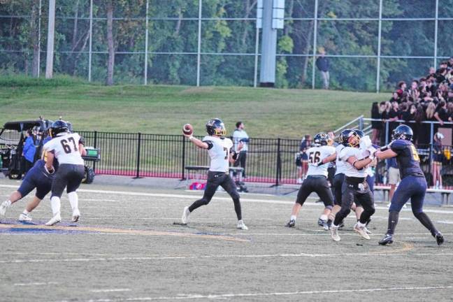 <b>West Milford quarterback Aydin Deane throws the ball in the first half. </b>