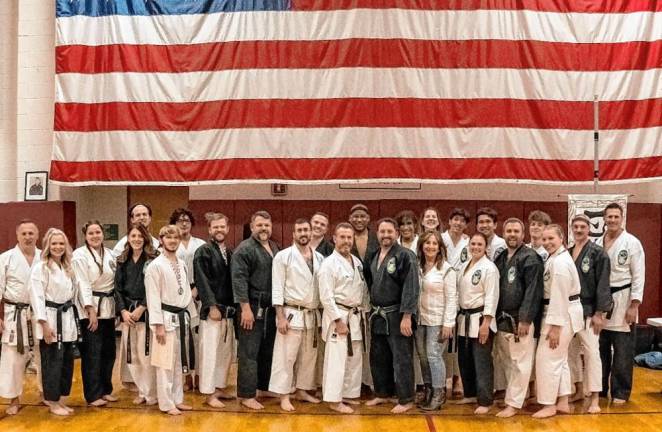 The East West Karate and Fitness yudansha, or family of black belts.