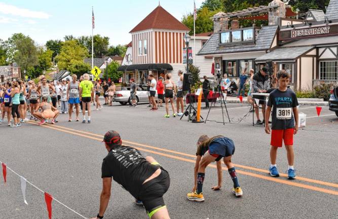 Runners stretch before the race.