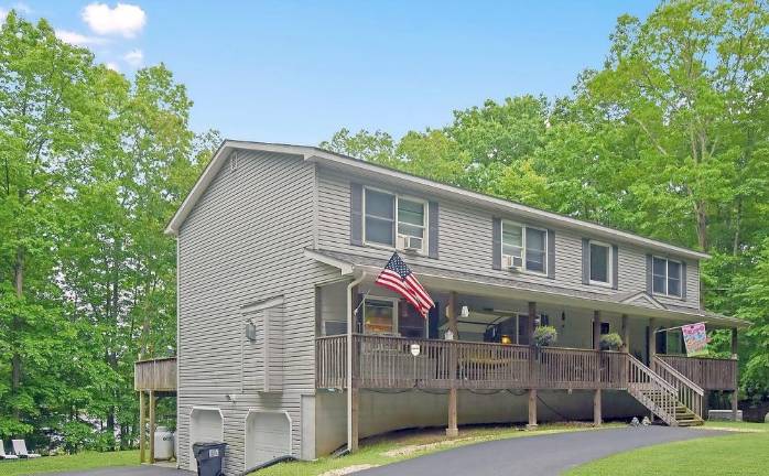 Elegant five-bedroom lakefront colonial is an entertainer’s dream