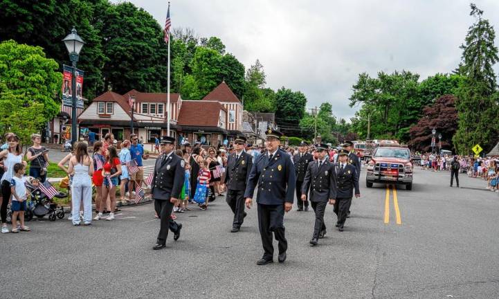 Members of the Sparta Fire Department march in the parade.