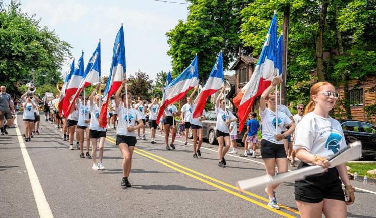 The Sparta High School Marching Band takes part in the parade.