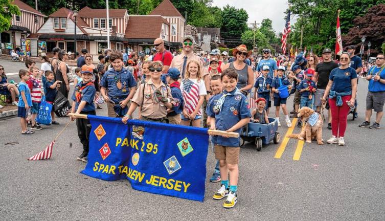 Cub Scouts march in the parade.