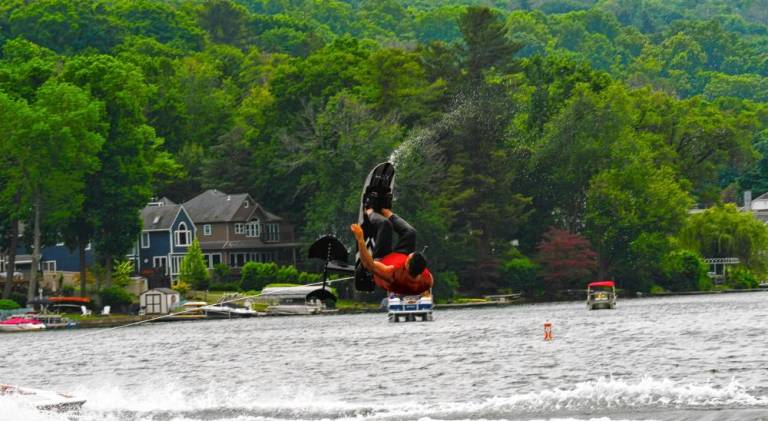 Damon Jenkins performs flips on his hydrofoil.