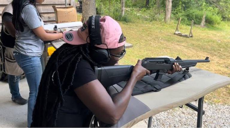 Malikqua Burton, a Newburgh nurse, at the Viola Rod and Gun Club in Hyde Park, NY. She has been waiting nearly two years for a handgun permit to protect herself on her late-night commute to work at a hospital trauma unit.