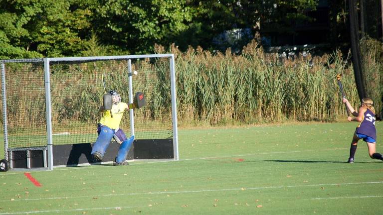 Pope John's goalie Ciera Smith with remarkable save versus Vernon, Oct. 2